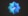 Light and dark blue spiked circle, with a white check mark in the center