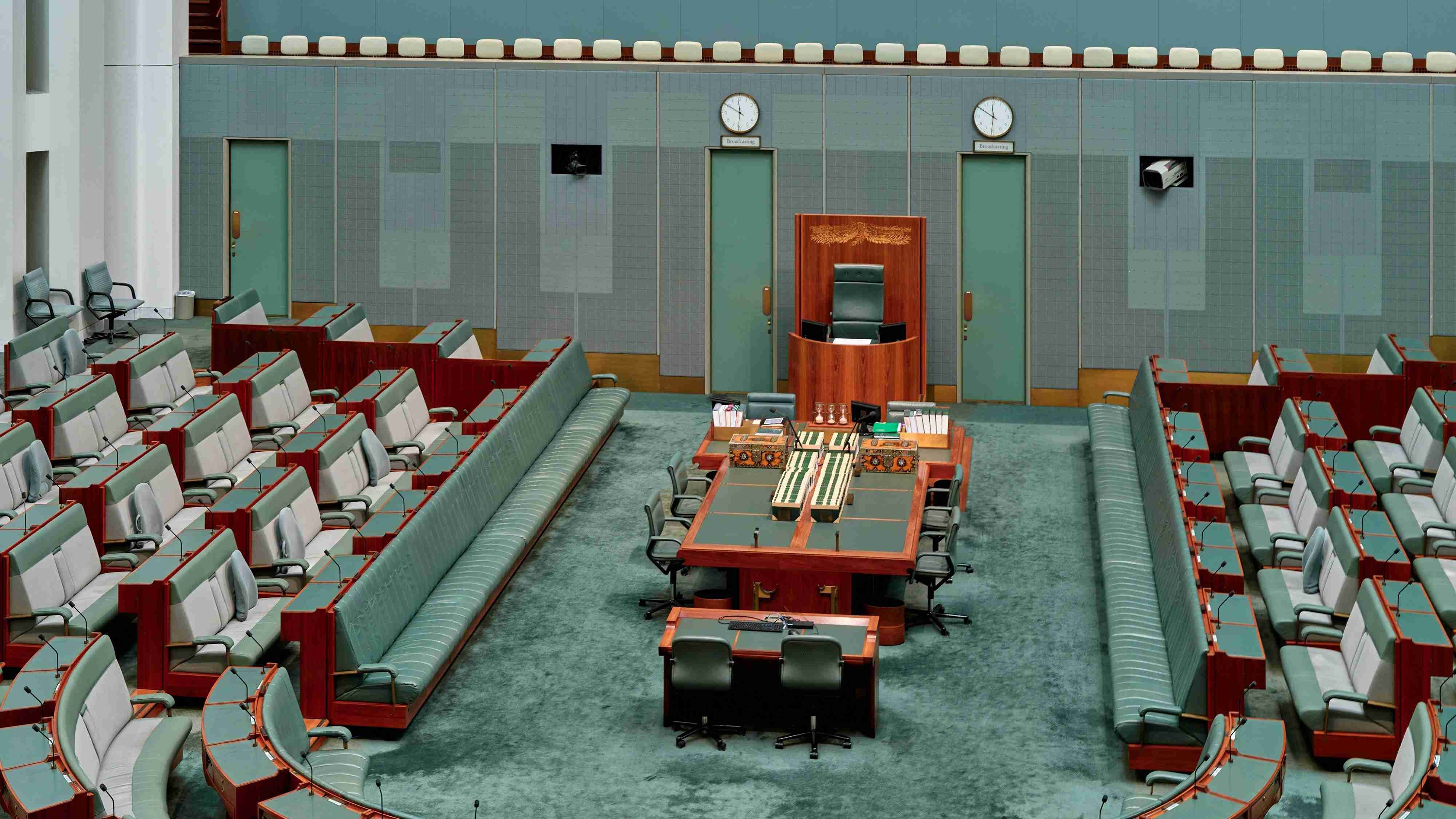 An image of an empty parliament room.